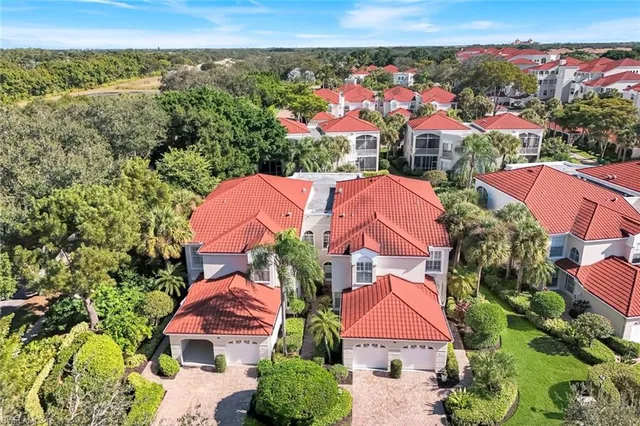 an aerial view of house with yard