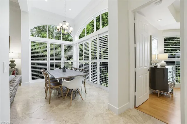 a table and chairs in a balcony