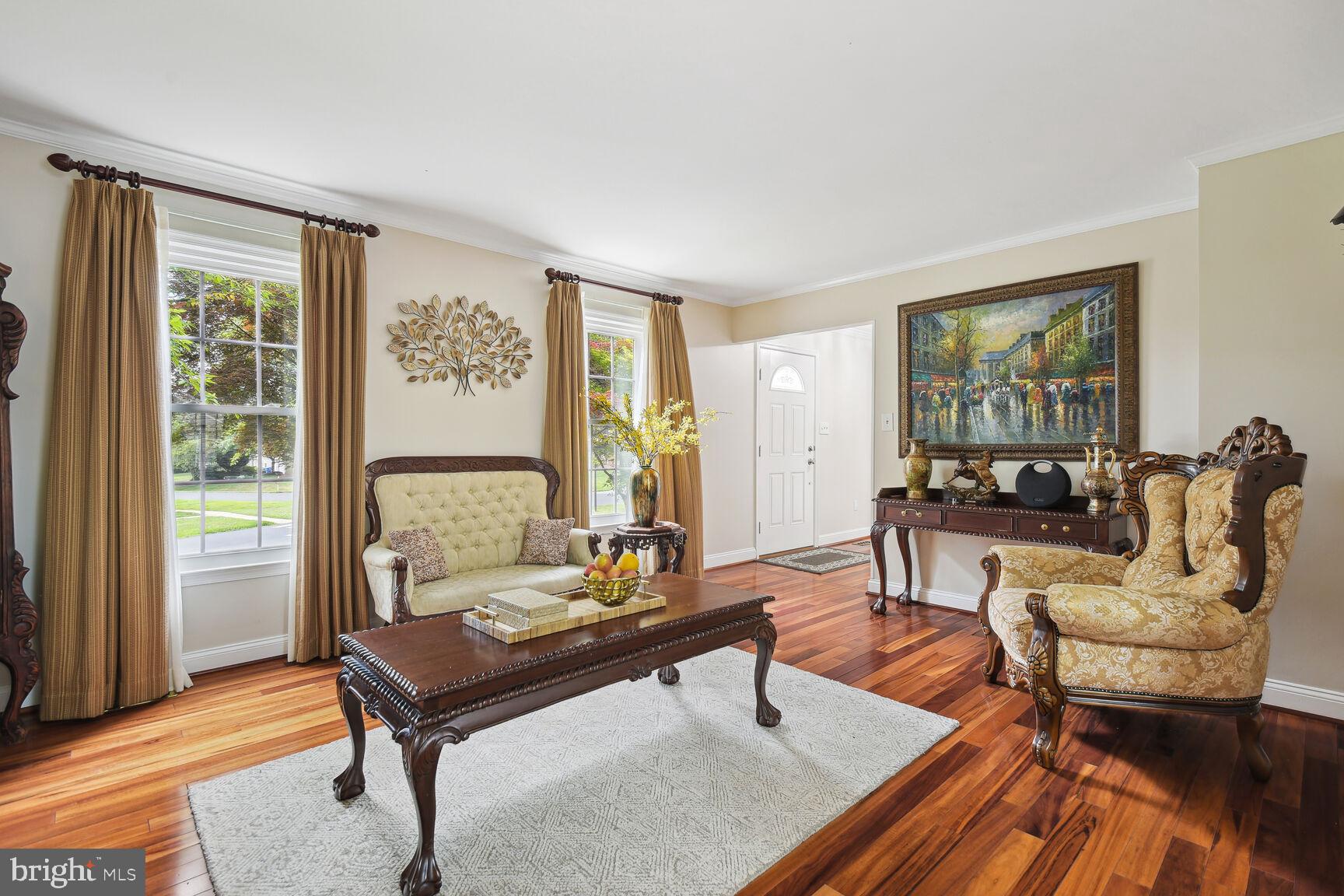12324 Triple Crown Road North Potomac, MD 20878 - Photo 12 of 49 a living room with furniture and a window