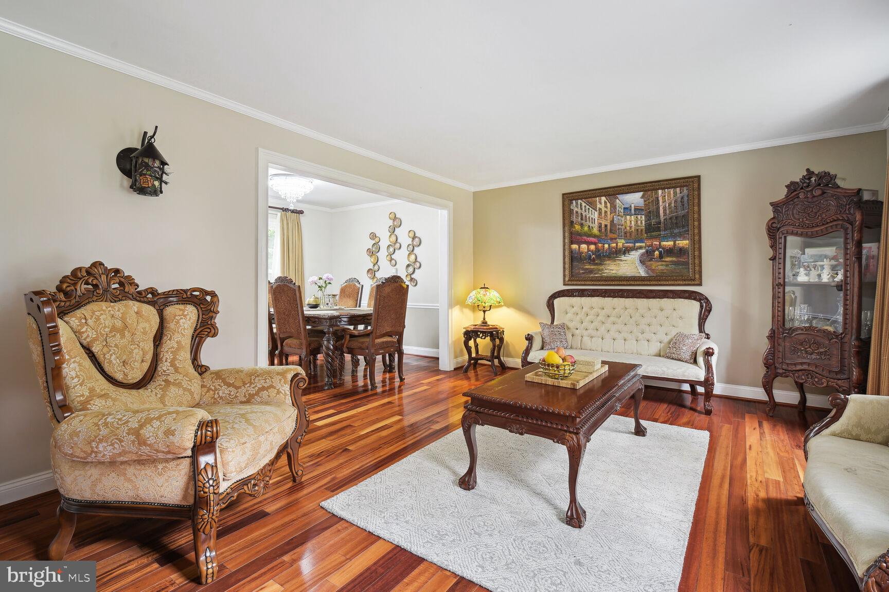 12324 Triple Crown Road North Potomac, MD 20878 - Photo 13 of 49 a living room with furniture and a mirror