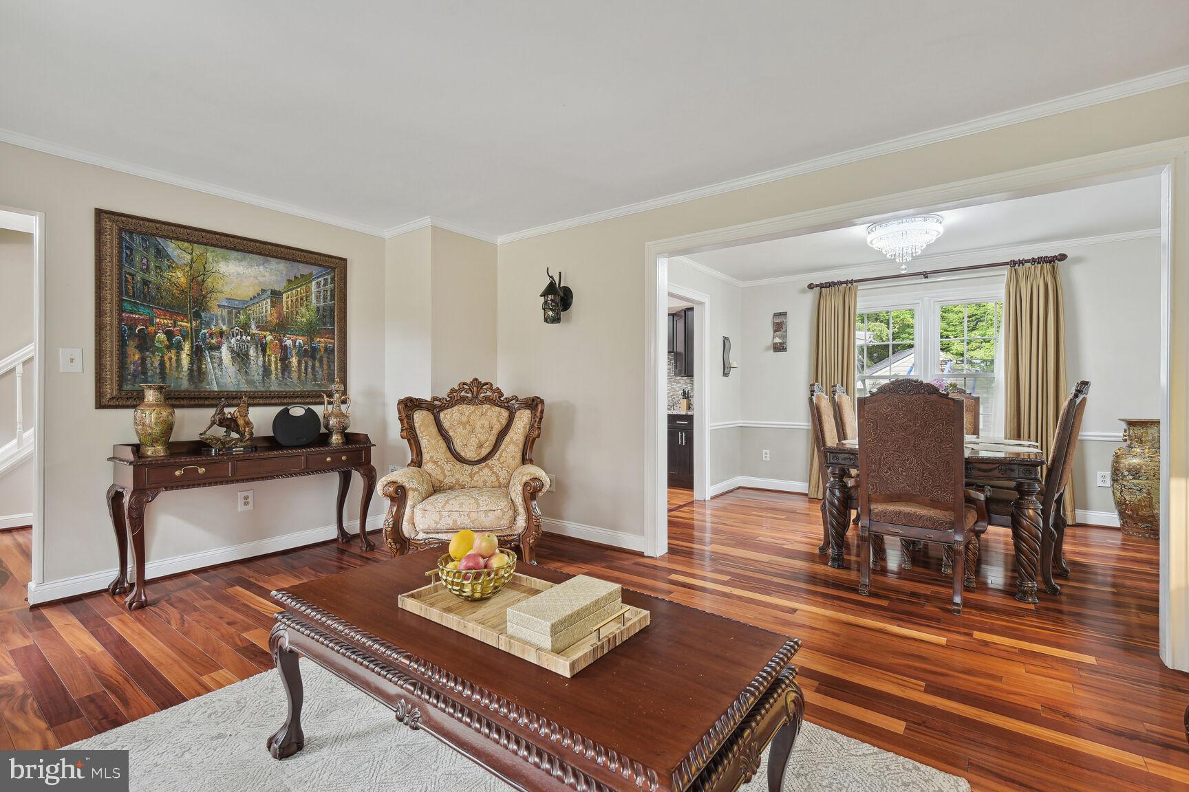 12324 Triple Crown Road North Potomac, MD 20878 - Photo 15 of 49 a living room with furniture and wooden floor