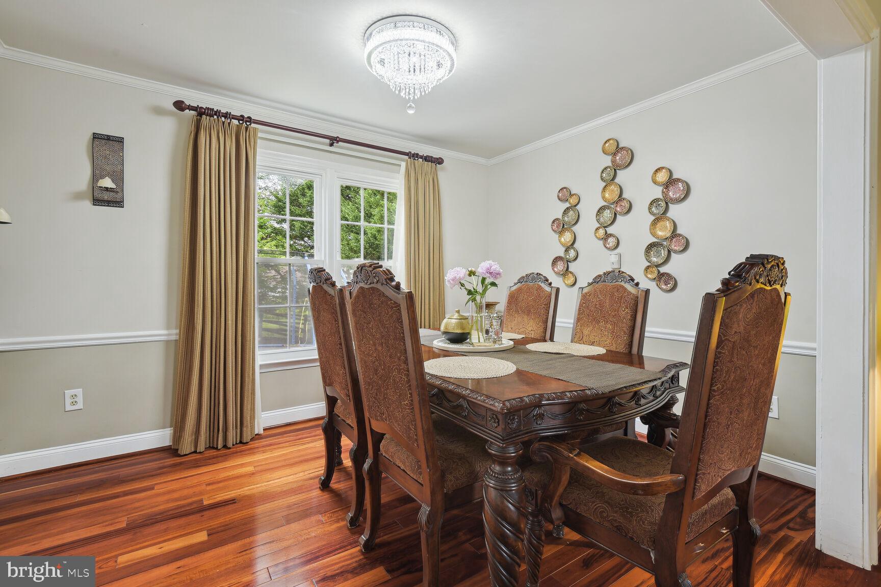 12324 Triple Crown Road North Potomac, MD 20878 - Photo 16 of 49 a view of a dining room with furniture window and outside view