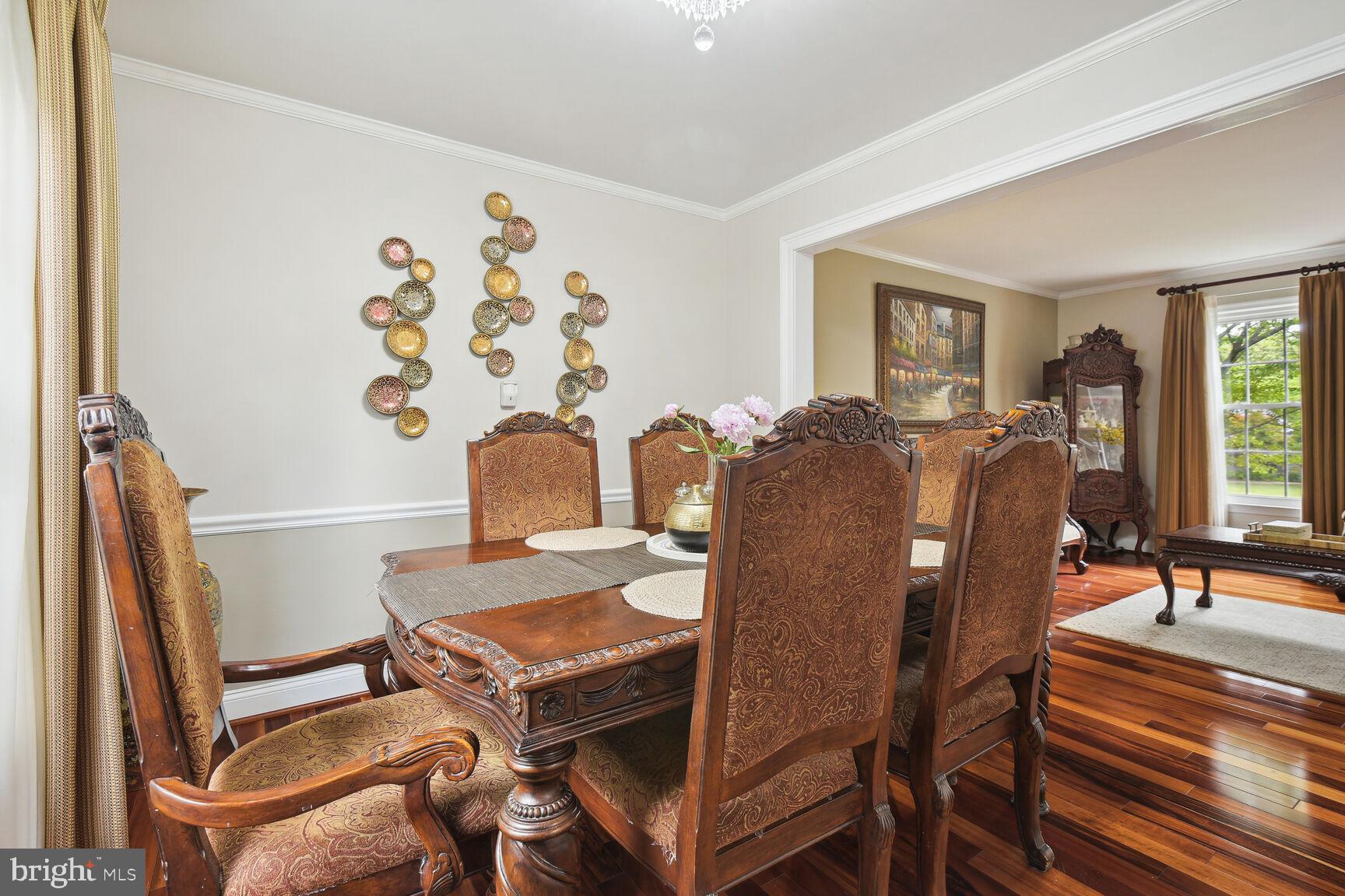 12324 Triple Crown Road North Potomac, MD 20878 - Photo 17 of 49 a balcony with chairs and a table