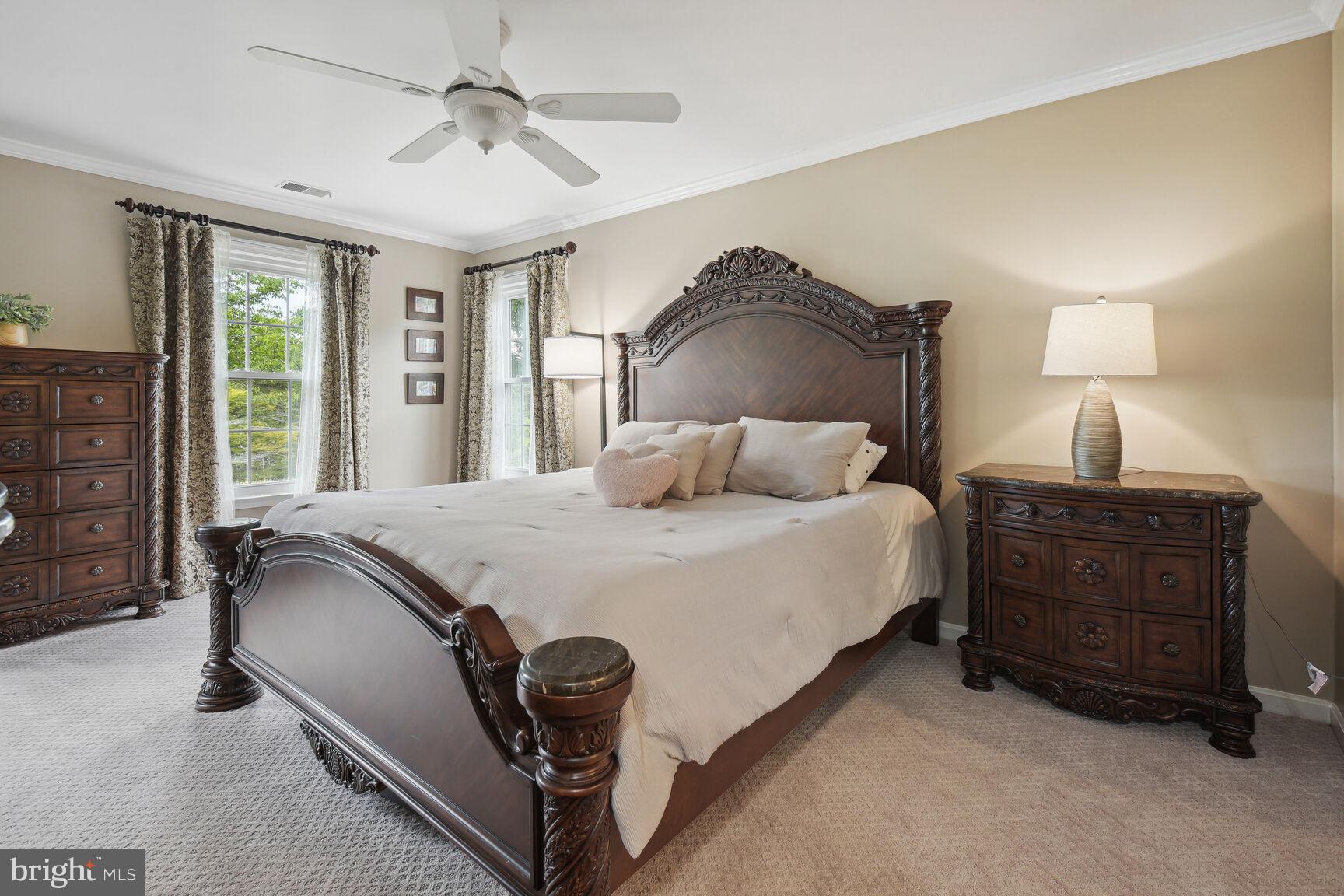 12324 Triple Crown Road North Potomac, MD 20878 - Photo 22 of 49 a bedroom with a bed and window