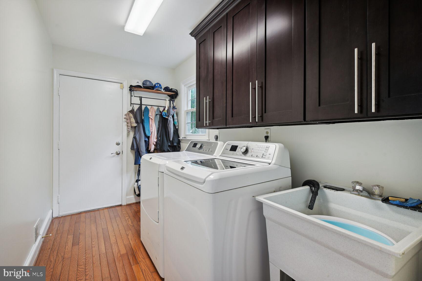 12324 Triple Crown Road North Potomac, MD 20878 - Photo 30 of 49 a utility room with dryer and washer