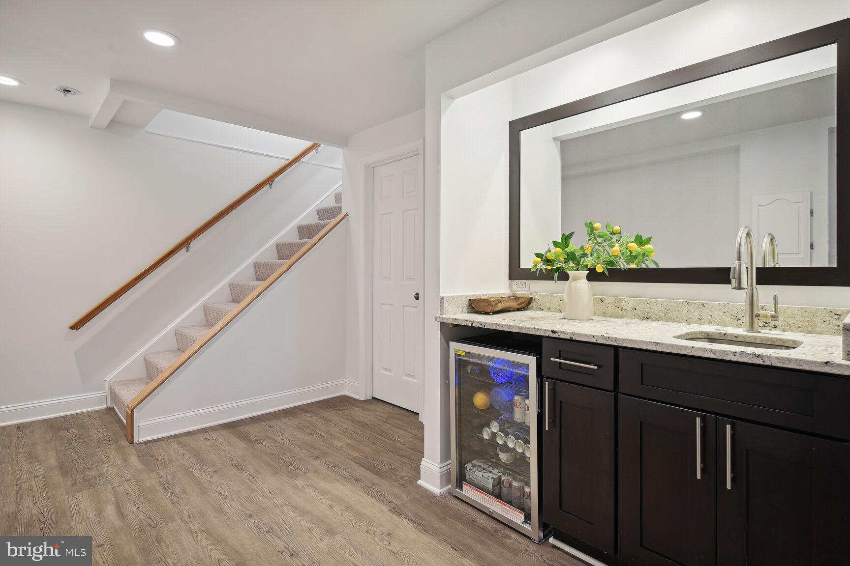 12324 Triple Crown Road North Potomac, MD 20878 - Photo 37 of 49 a bathroom with a sink and a mirror