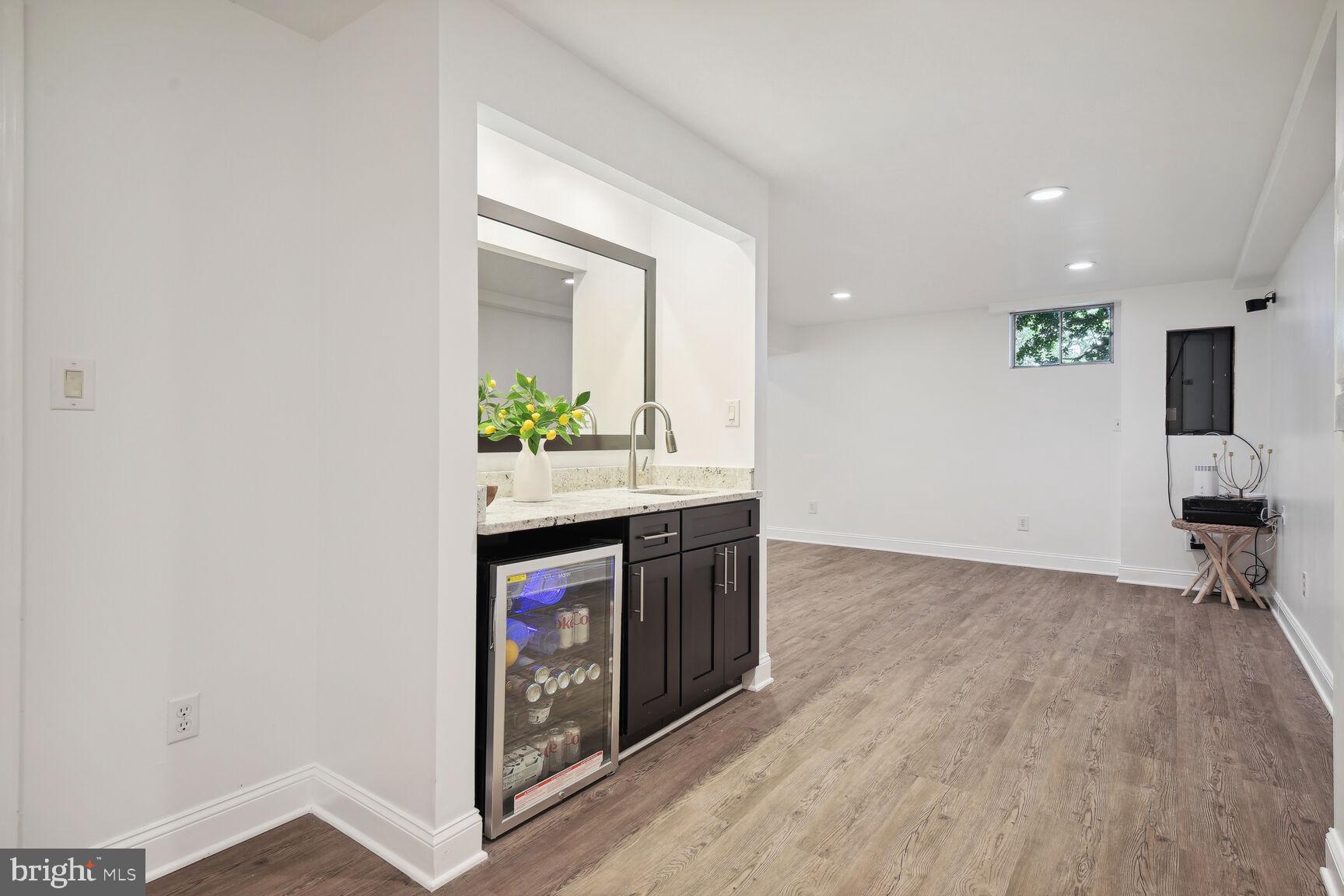 12324 Triple Crown Road North Potomac, MD 20878 - Photo 38 of 49 a kitchen with stainless steel appliances granite countertop a stove and a sink
