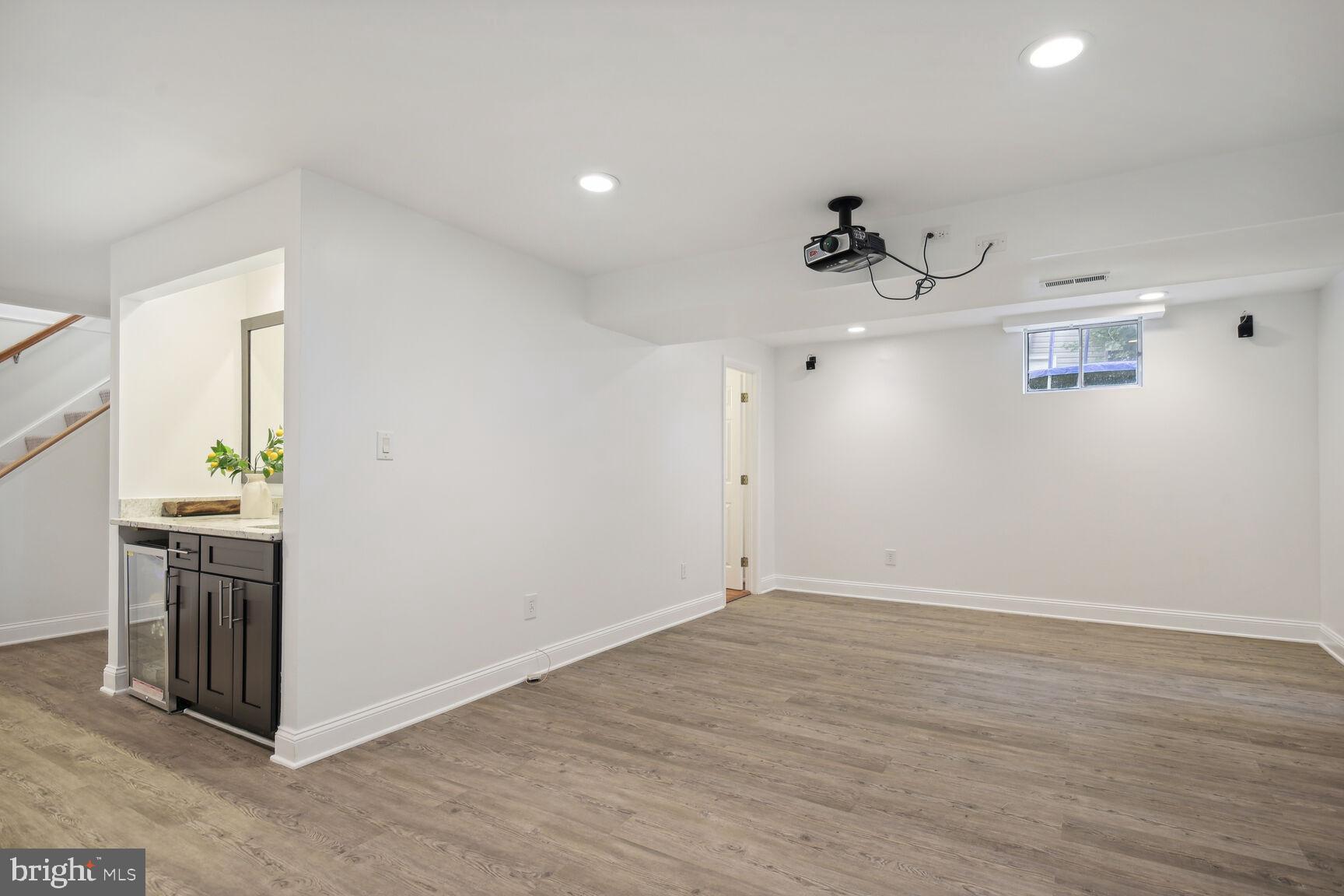12324 Triple Crown Road North Potomac, MD 20878 - Photo 39 of 49 wooden floor in an empty room with a window