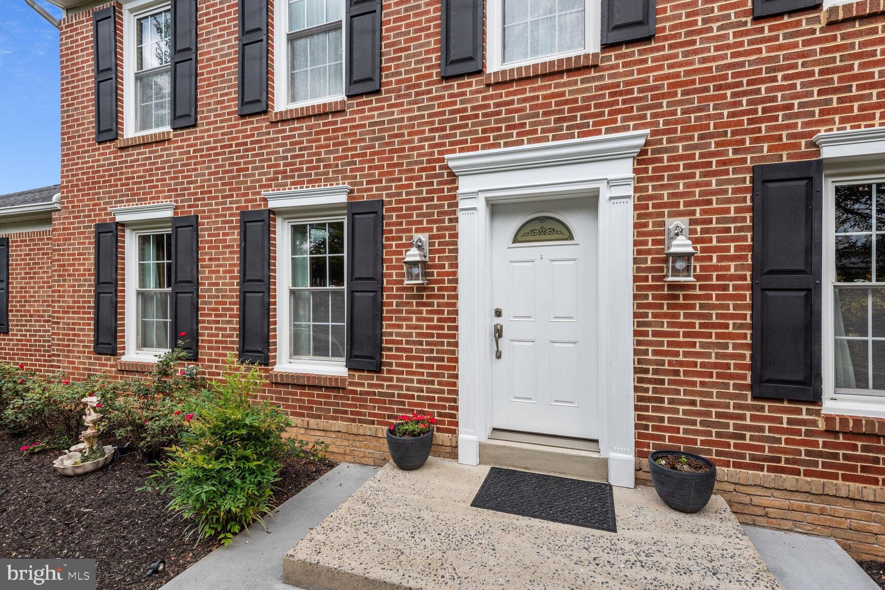 12324 Triple Crown Road North Potomac, MD 20878 - Photo 4 of 49 a front view of a house
