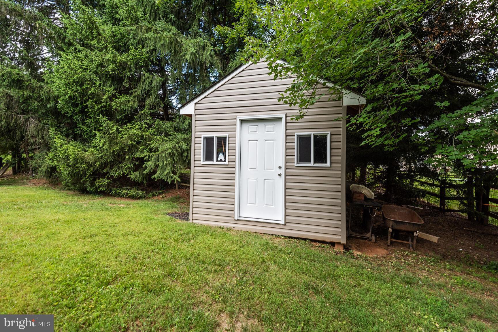 12324 Triple Crown Road North Potomac, MD 20878 - Photo 41 of 49 a view of a house with a backyard