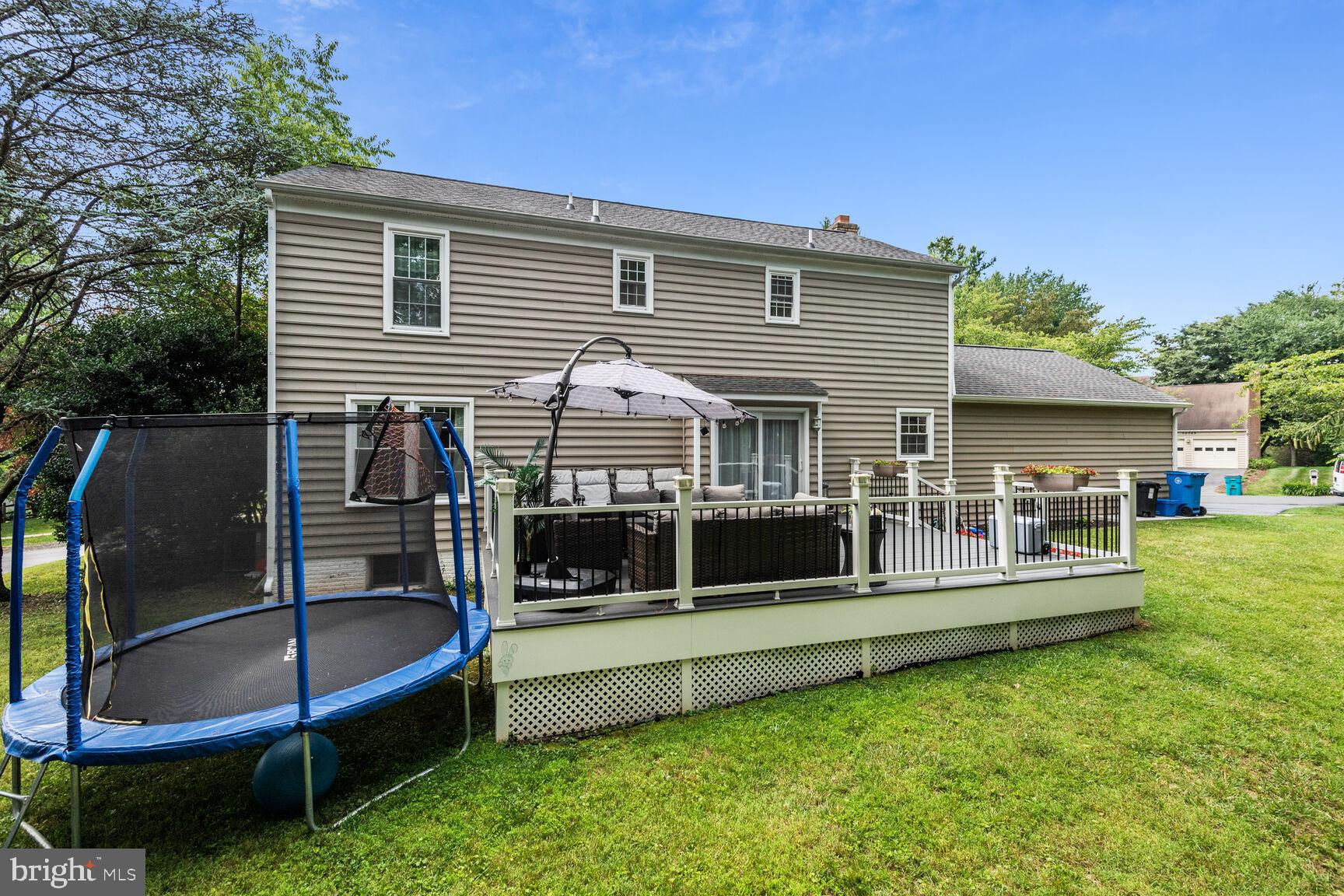 12324 Triple Crown Road North Potomac, MD 20878 - Photo 45 of 49 a front view of house with yard