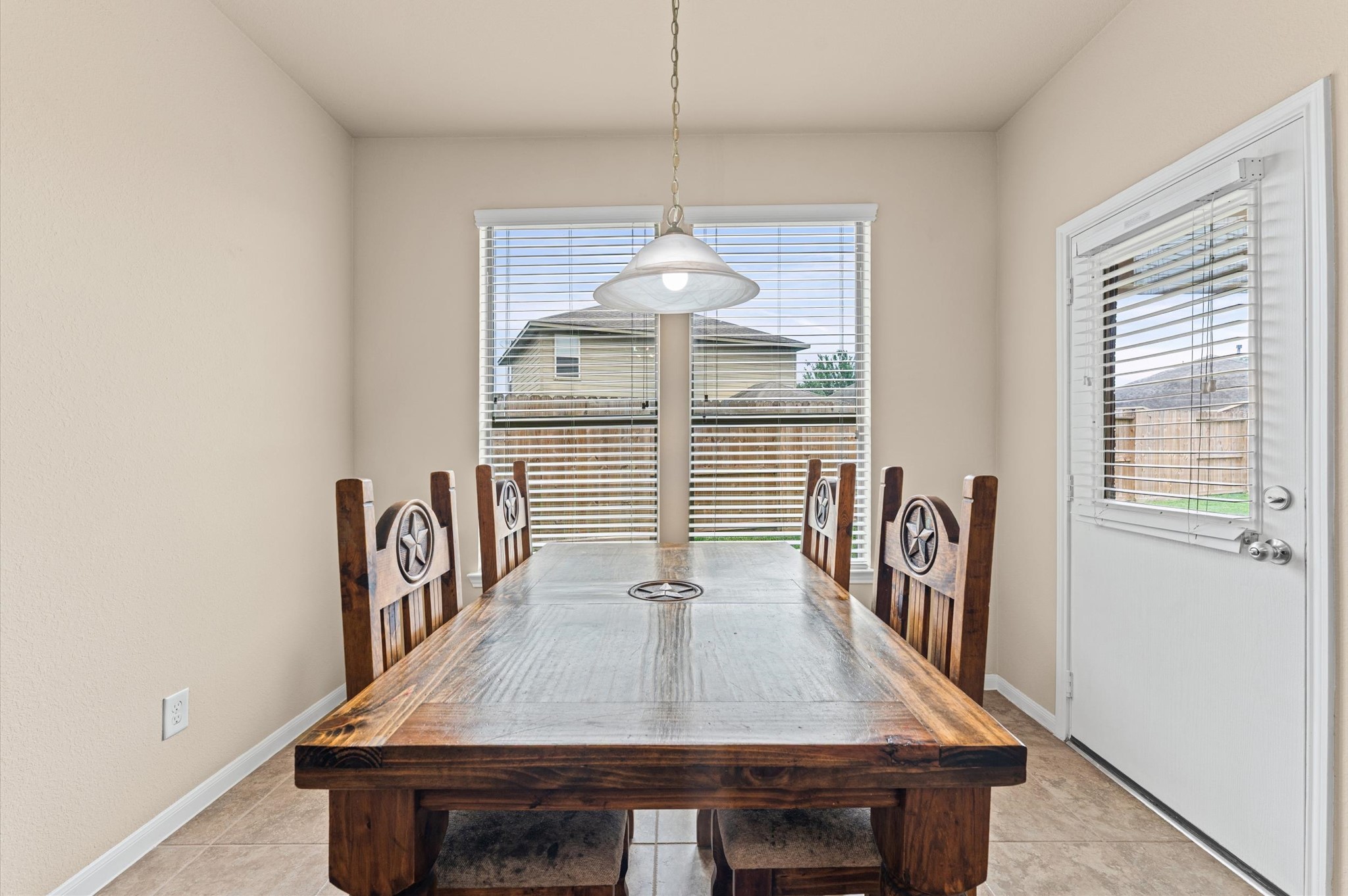 22534 Rustic Valley Court Porter, TX 77365 - Photo 11 of 27 a dining room with furniture and window