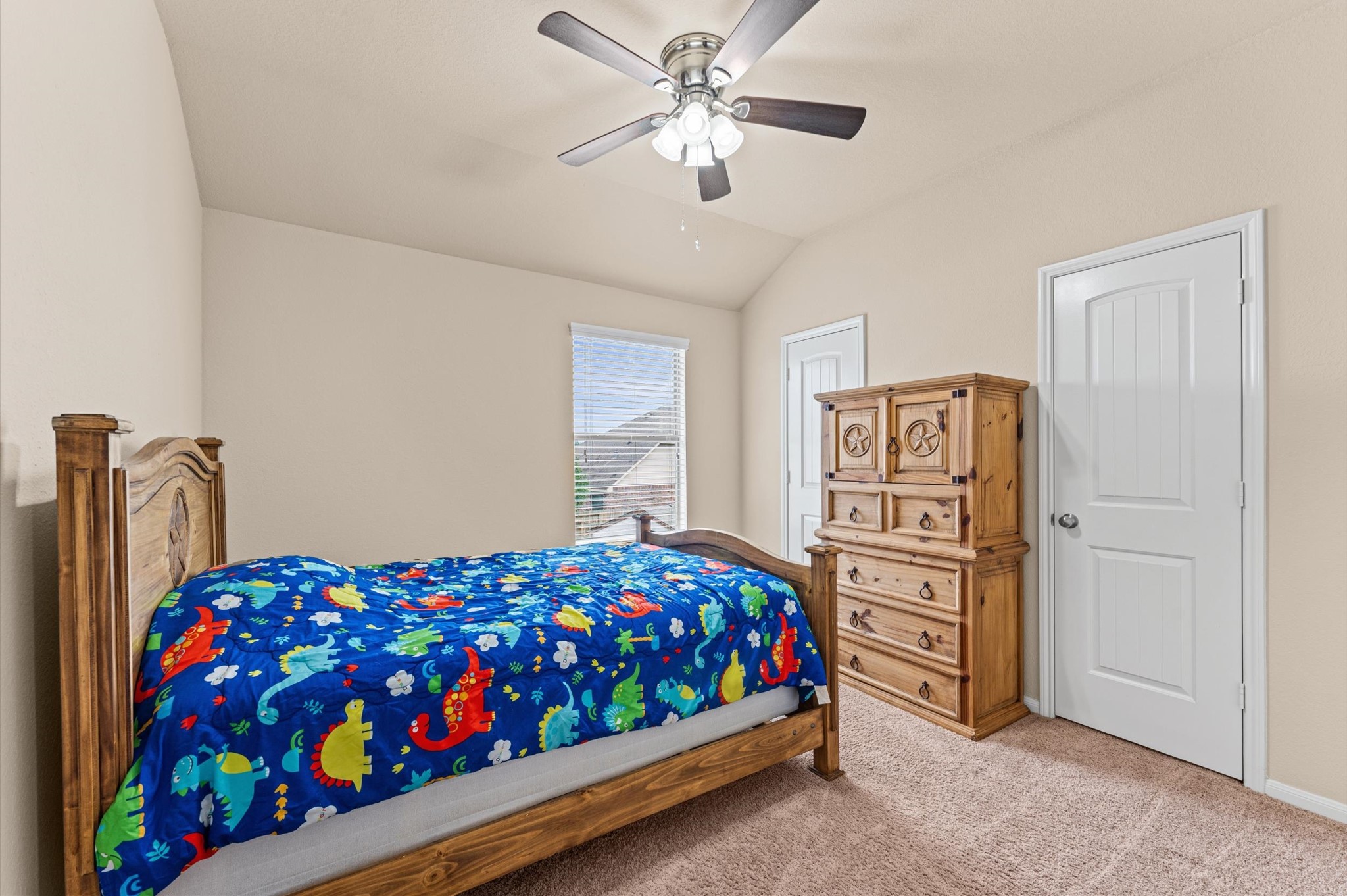 22534 Rustic Valley Court Porter, TX 77365 - Photo 20 of 27 a bedroom with bed and a window