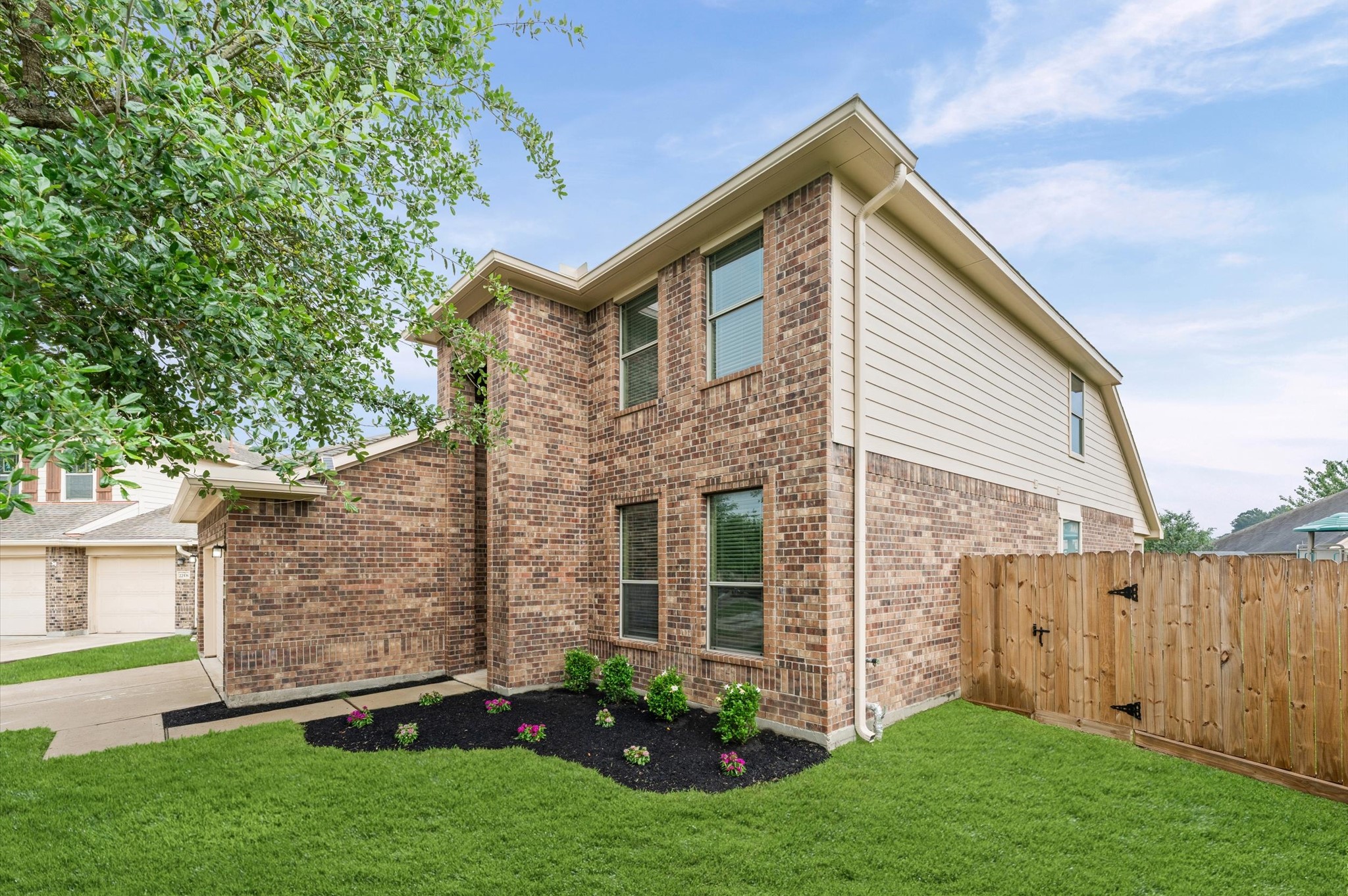 22534 Rustic Valley Court Porter, TX 77365 - Photo 2 of 27 front view of a house with a yard