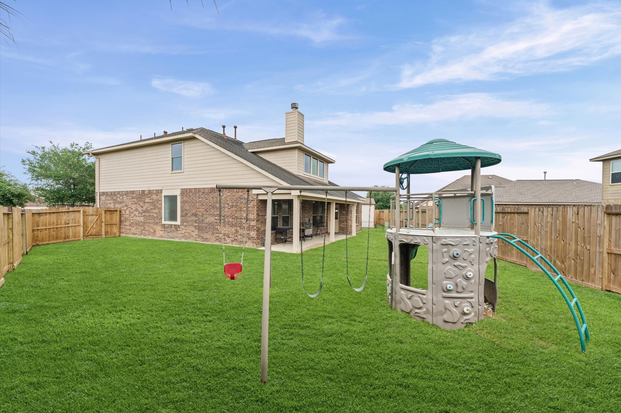 22534 Rustic Valley Court Porter, TX 77365 - Photo 22 of 27 a view of a house with a yard