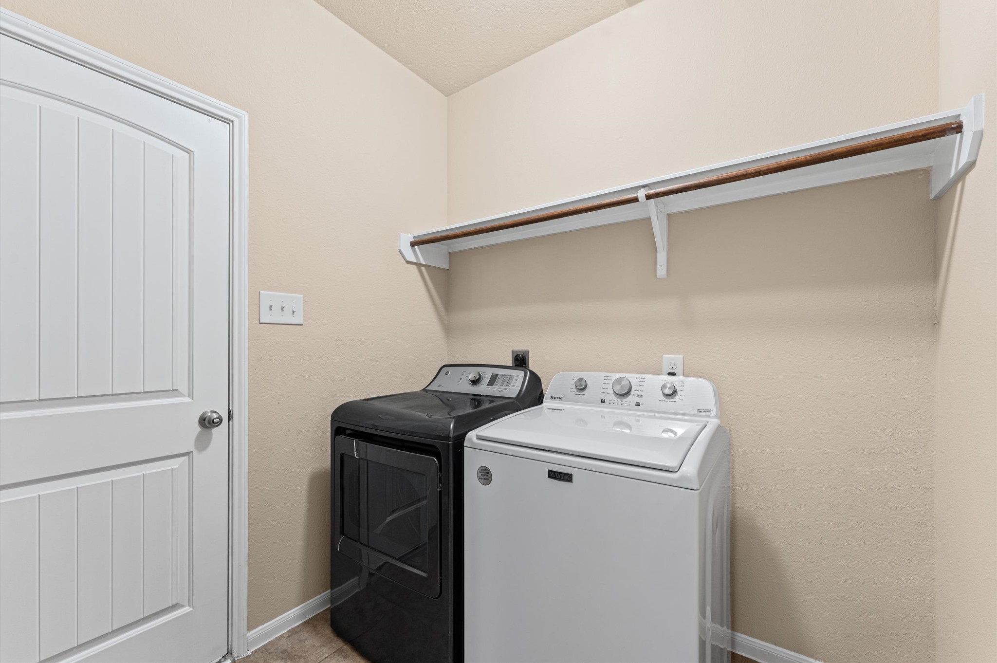 22534 Rustic Valley Court Porter, TX 77365 - Photo 9 of 27 a utility room with dryer and washer