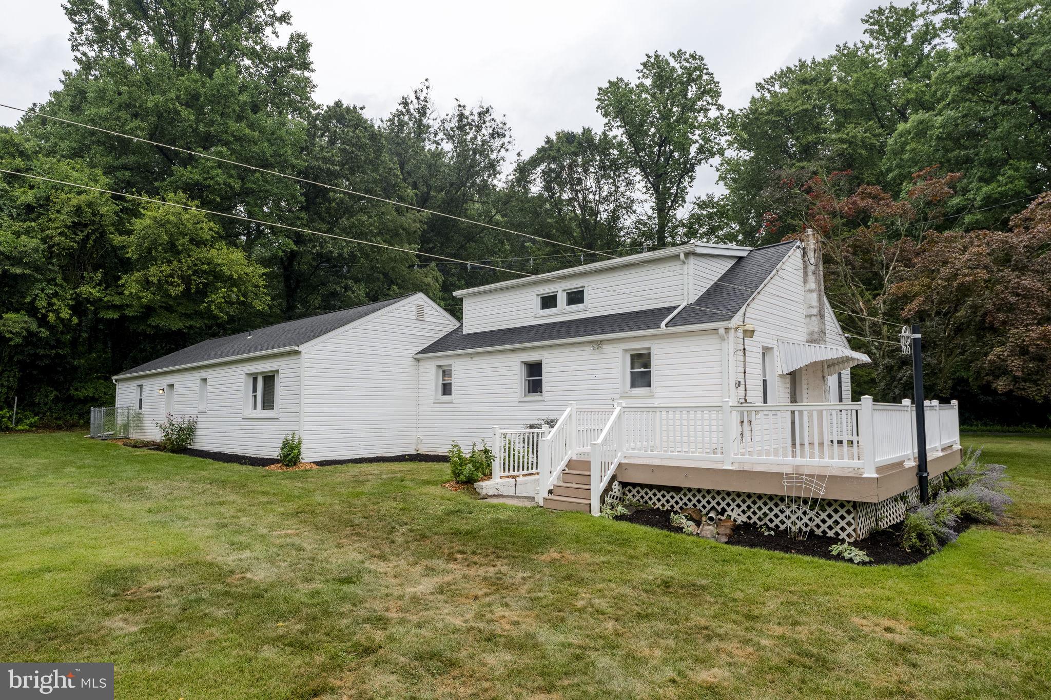65 Compass Road Parkesburg, PA 19365 - Photo 9 of 61 Charming home nestled in lush greenery.