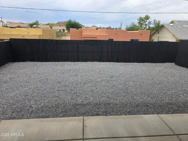 a view of balcony with wooden floor