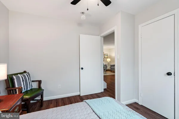 a bathroom with a sink toilet and mirror