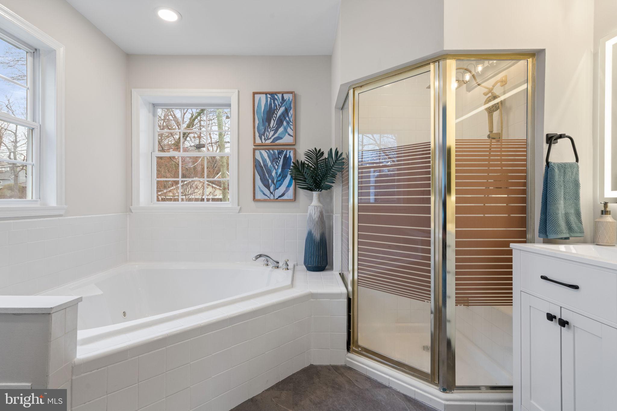4009 Roberts Road Fairfax, VA 22032 - Photo 26 of 60 Serene primary bathroom with modern fixtures.