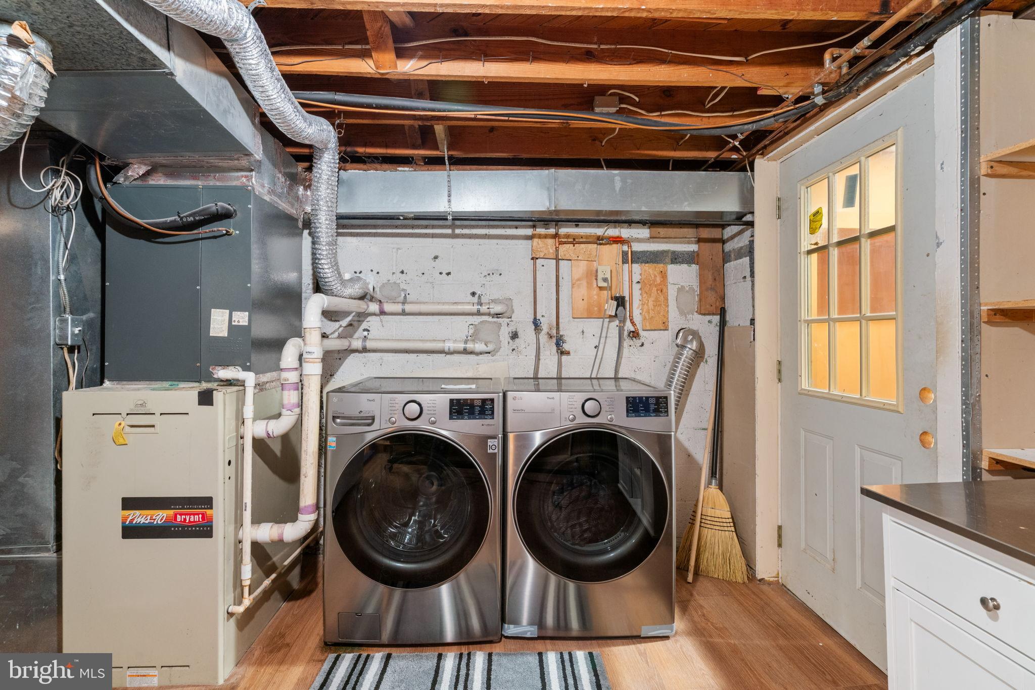 4009 Roberts Road Fairfax, VA 22032 - Photo 43 of 60 Modern laundry space with ample storage.