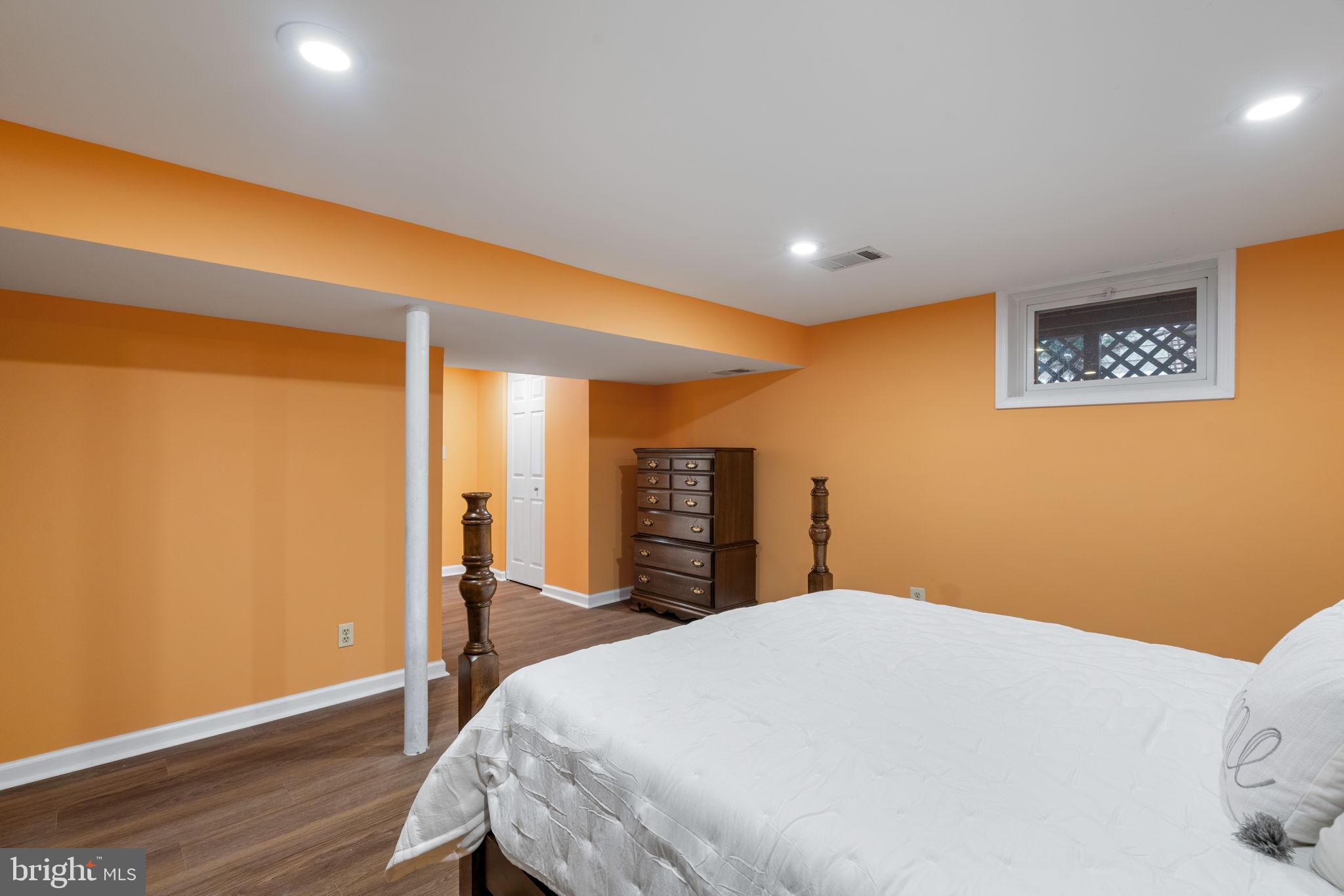 4009 Roberts Road Fairfax, VA 22032 - Photo 46 of 61 Vibrant basement retreat with warm hues.
