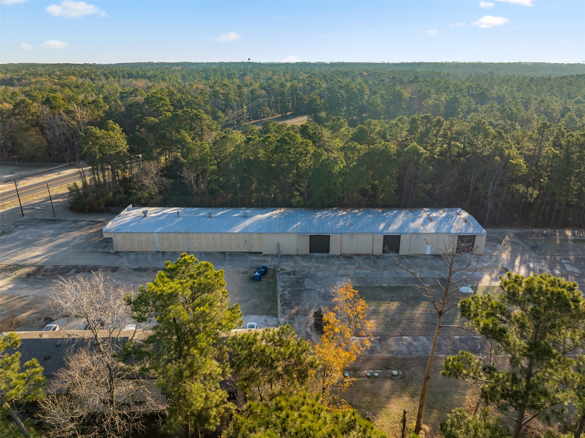 2001 Farm To Market Road 356 Onalaska, TX 77360 - Photo 27 of 35 an aerial view of a house with a yard