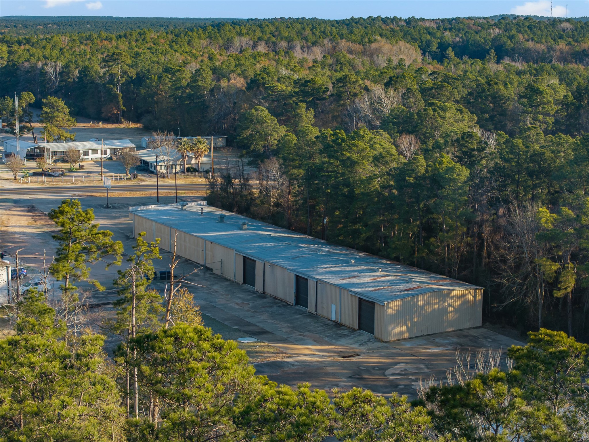 2001 Farm To Market Road 356 Onalaska, TX 77360 - Photo 34 of 35 a view of house with outdoor space