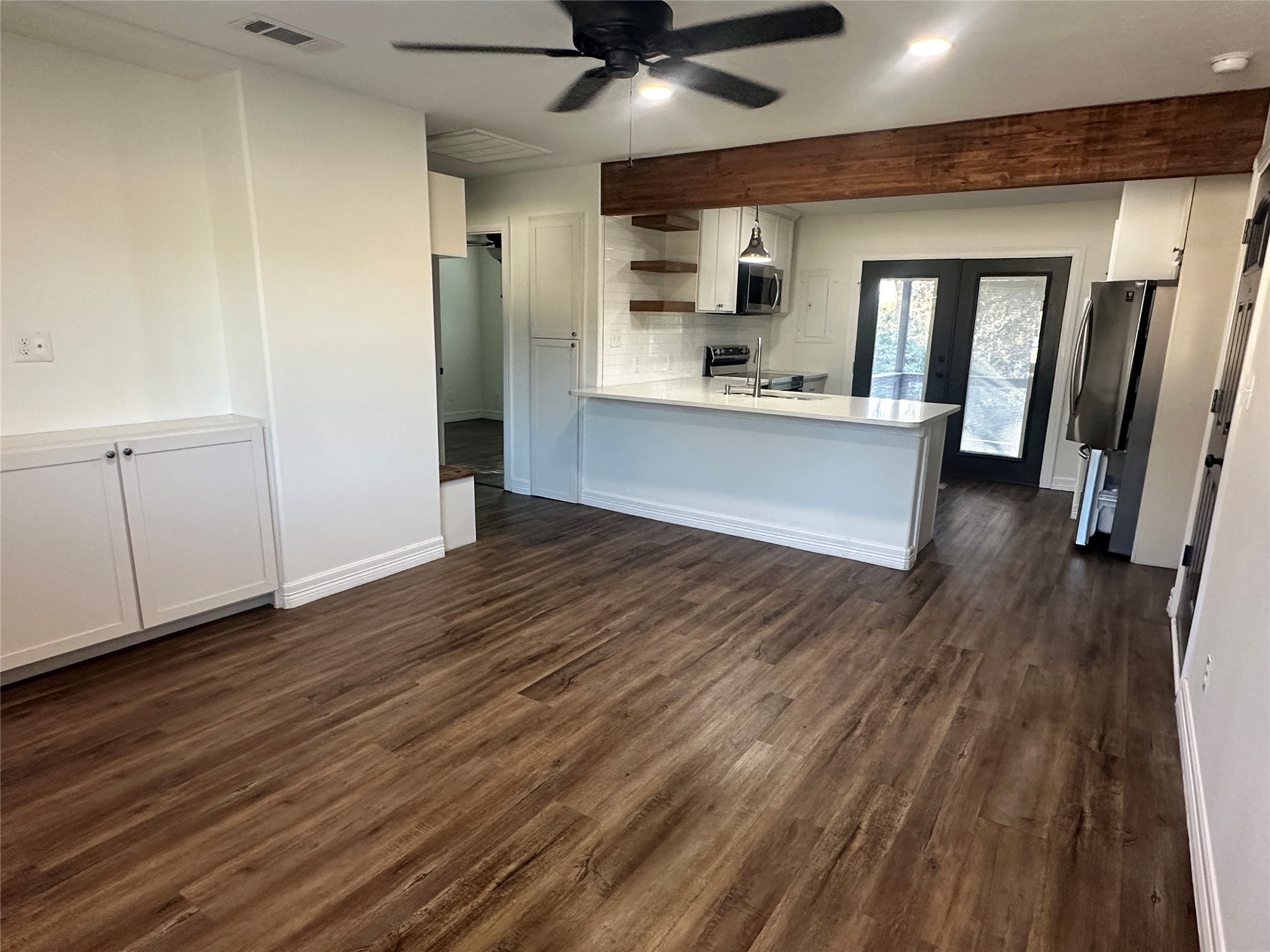 2001 Farm To Market Road 356 Onalaska, TX 77360 - Photo 4 of 35 a view of kitchen with cabinets and wooden floor