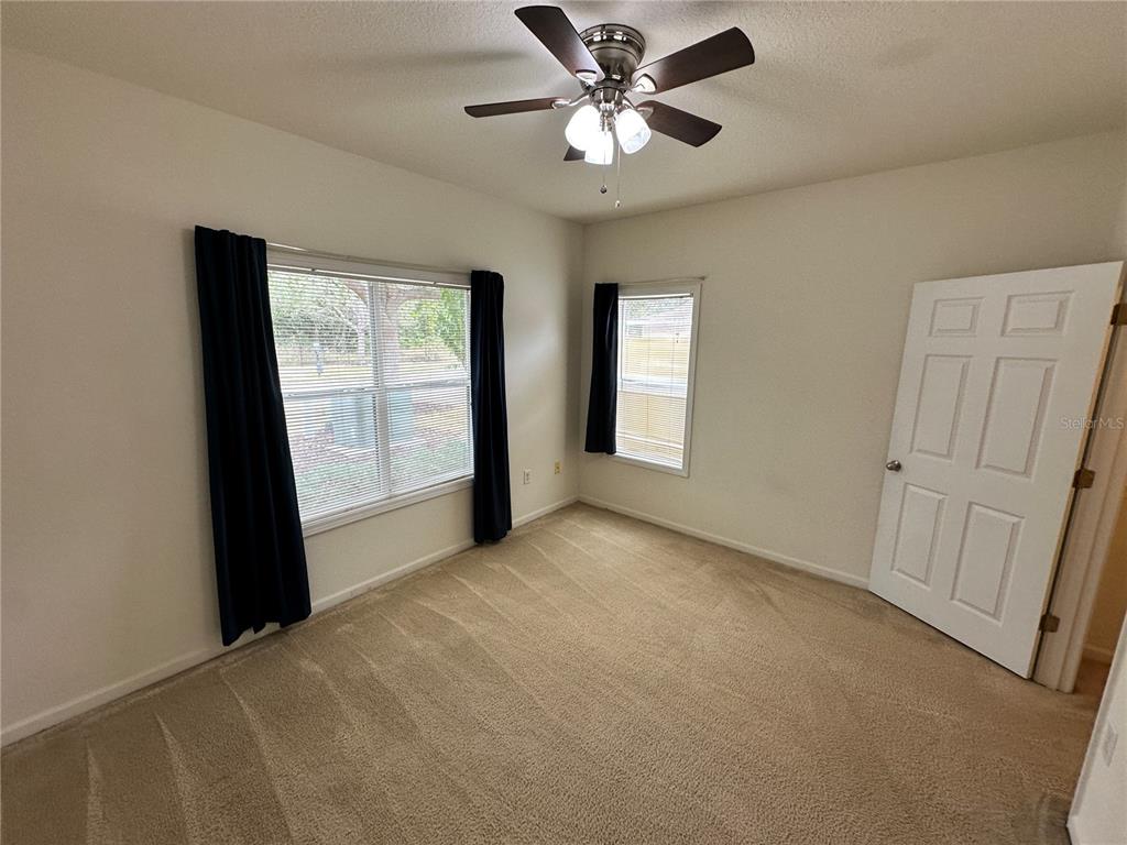 4802 51st Street West, Unit 413 Bradenton, FL 34210 - Photo 19 of 40 a view of an empty room with a window