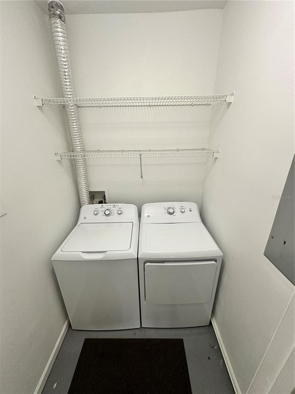 4802 51st Street West, Unit 413 Bradenton, FL 34210 - Photo 24 of 40 a utility room with dryer and washer