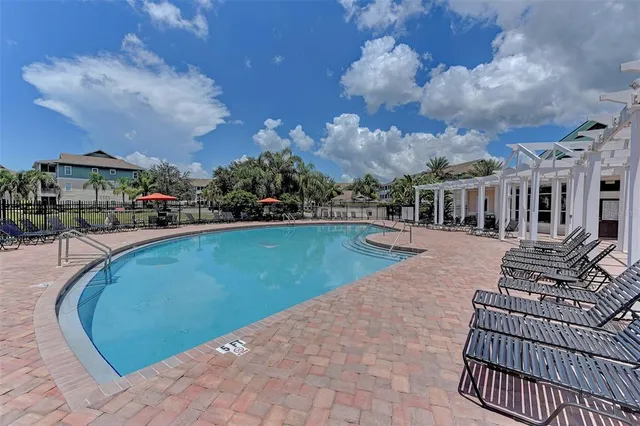 a view of a swimming pool with a garden