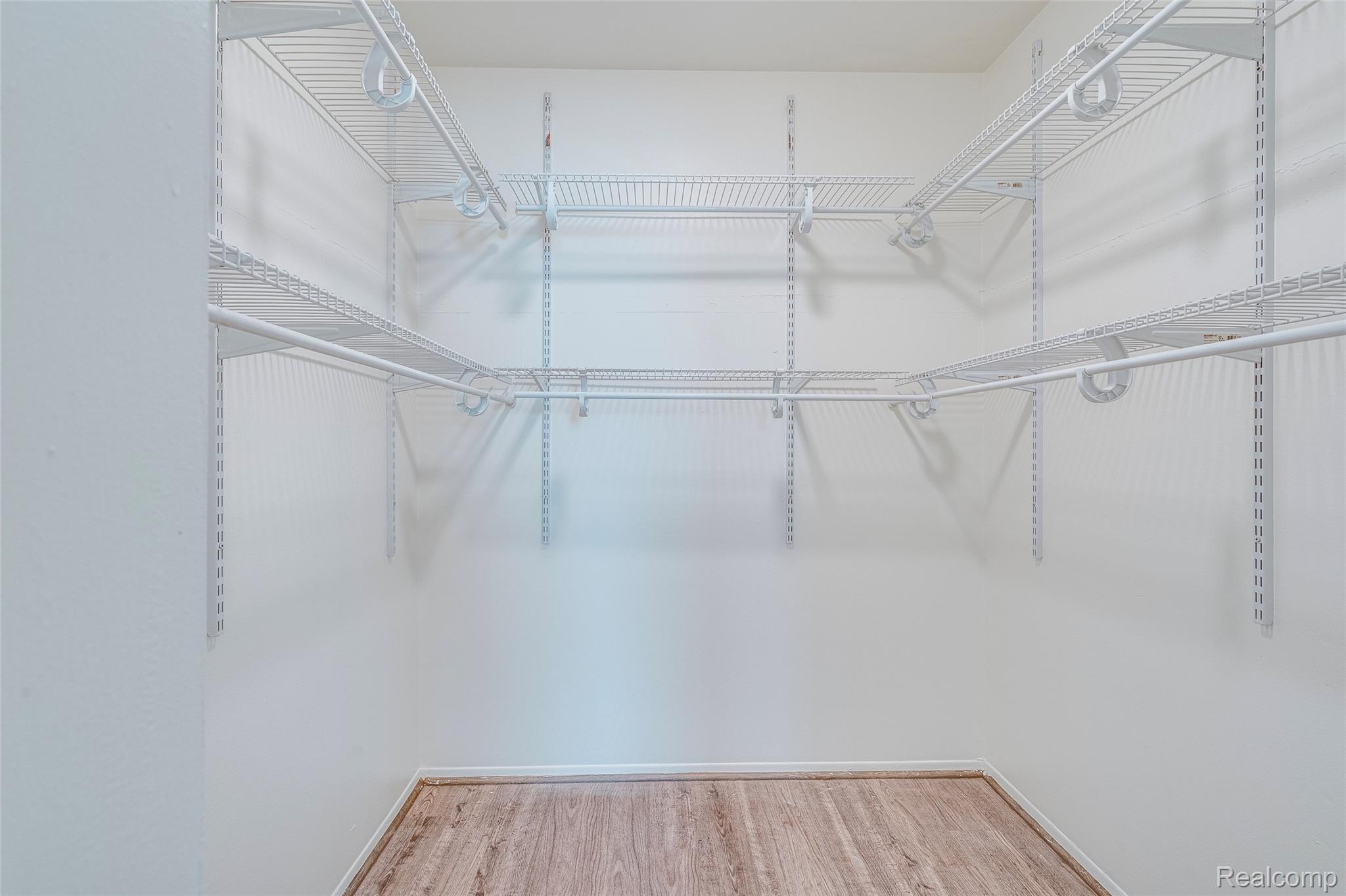 29860 West 12 Mile Road, Unit 604 Farmington, MI 48334 - Photo 17 of 26 Walk in closet with light wood-style flooring