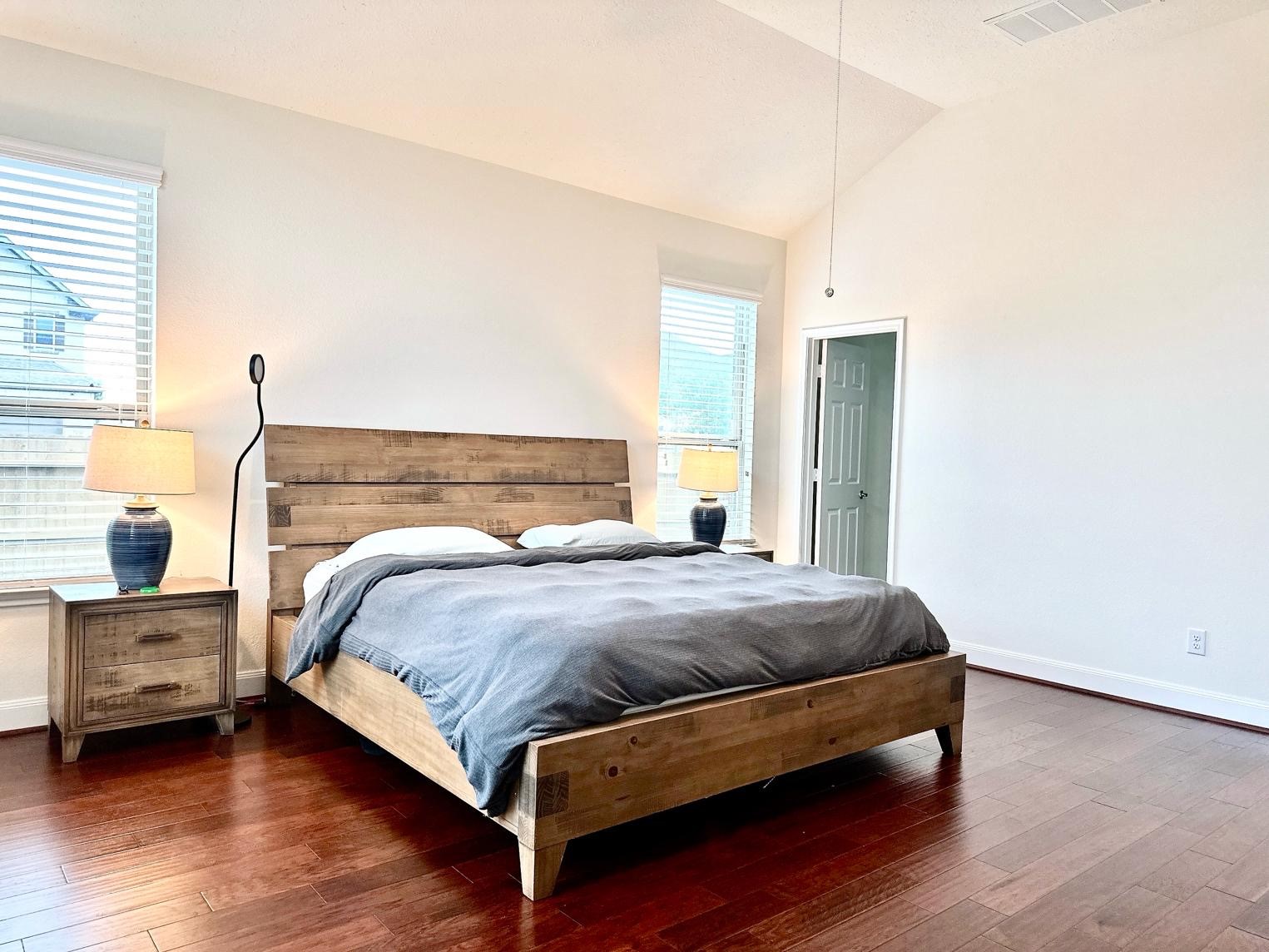 1110 Penny Ranch Lane Katy, TX 77494 - Photo 20 of 31 a bedroom with a bed and a window