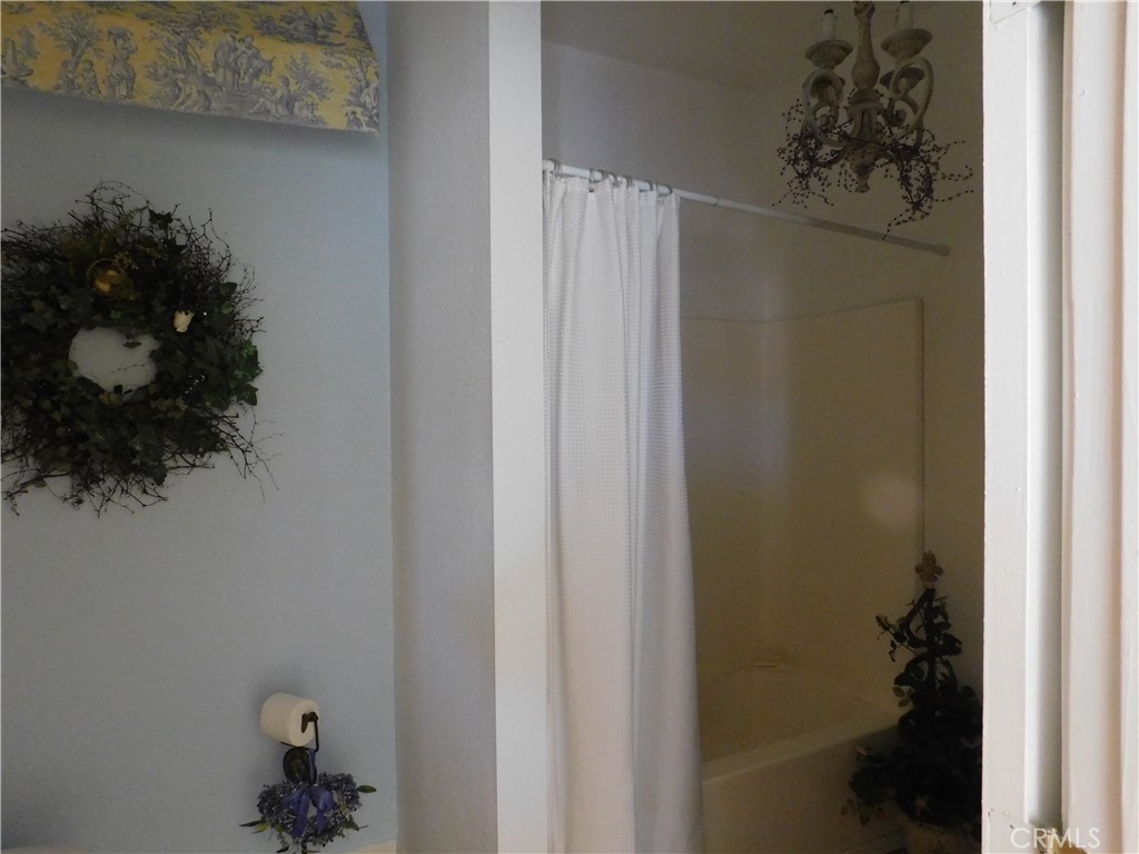 8934 Japatul Road Apple Valley, CA 92308 - Photo 14 of 16 a bathroom with a shower