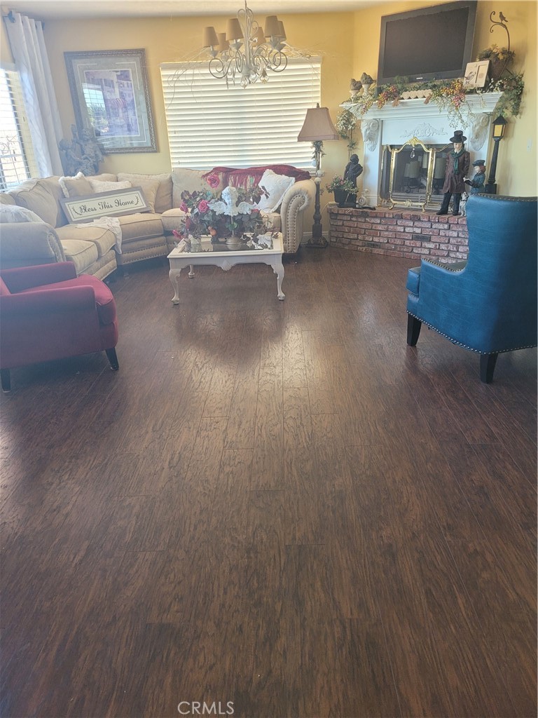 8934 Japatul Road Apple Valley, CA 92308 - Photo 5 of 16 a living room with furniture and a fireplace