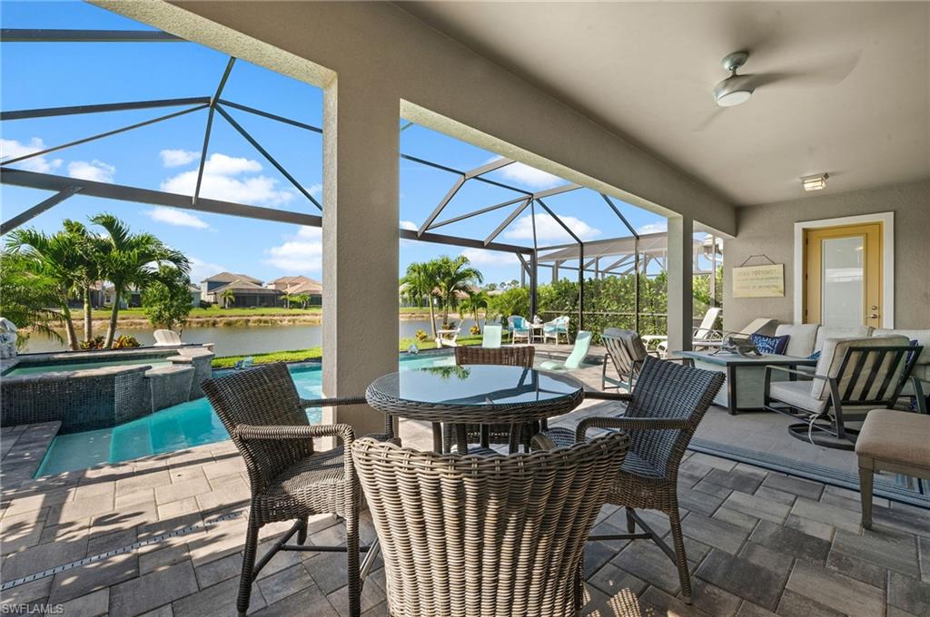 3521 Pilot Circle Naples, FL 34120 - Photo 17 of 36 a view of a dining room with furniture window and outside view