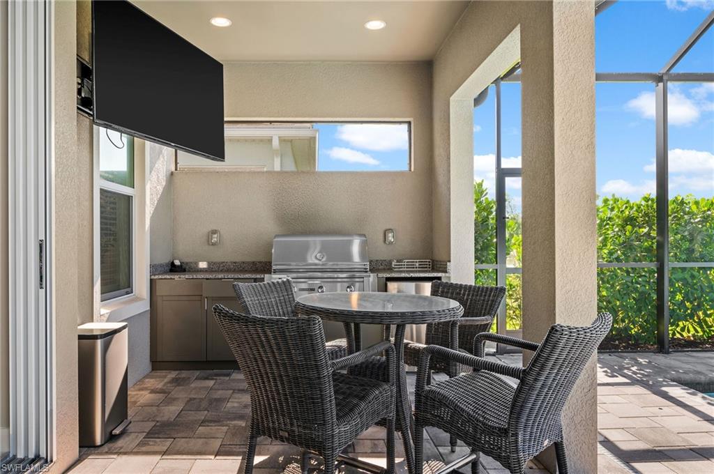3521 Pilot Circle Naples, FL 34120 - Photo 18 of 36 a view of a dining room with furniture window and outside view