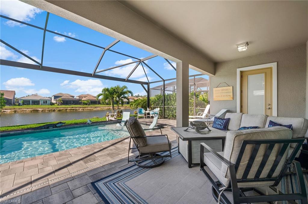 3521 Pilot Circle Naples, FL 34120 - Photo 22 of 36 a building outdoor space with patio furniture and garden