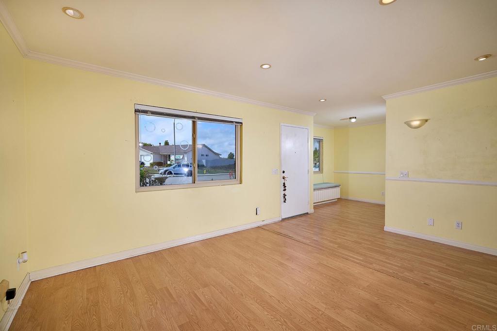 400 San Dimas Avenue Oceanside, CA 92057 - Photo 3 of 28 a view of a big room with wooden floor and window