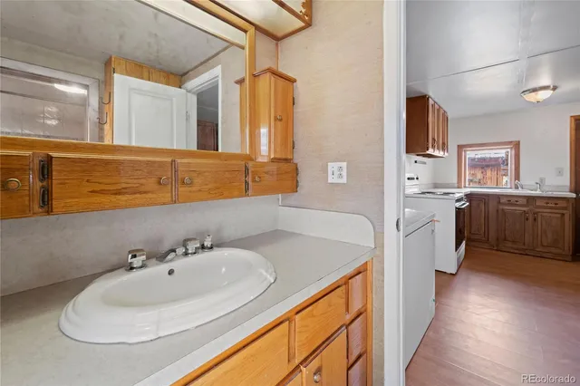 a view of a cafe with table and chairs