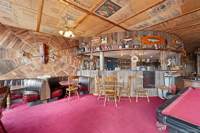 a view of a balcony with chairs