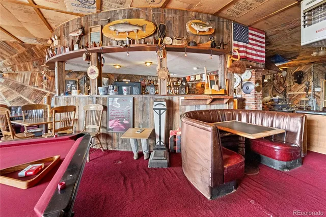 a view of a building with sitting area