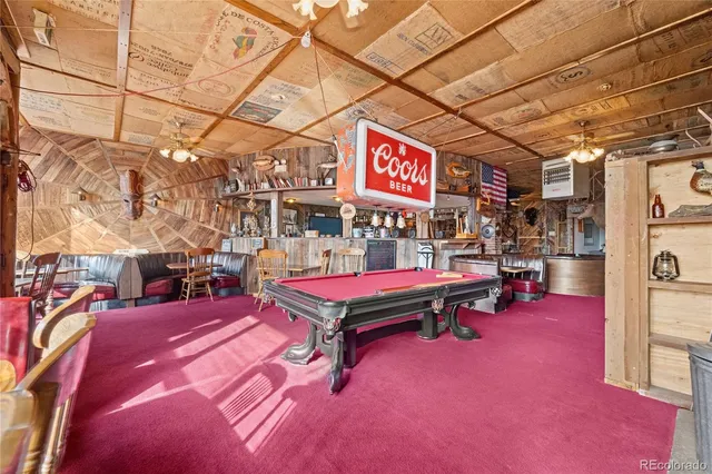 a view of balcony with furniture
