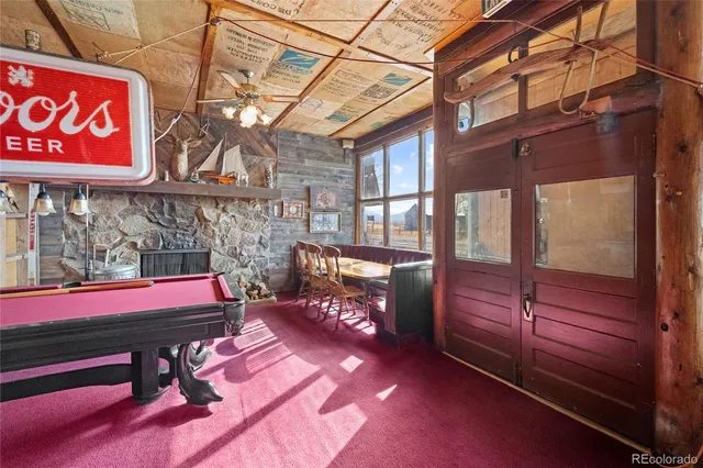 a room with furniture and a rug