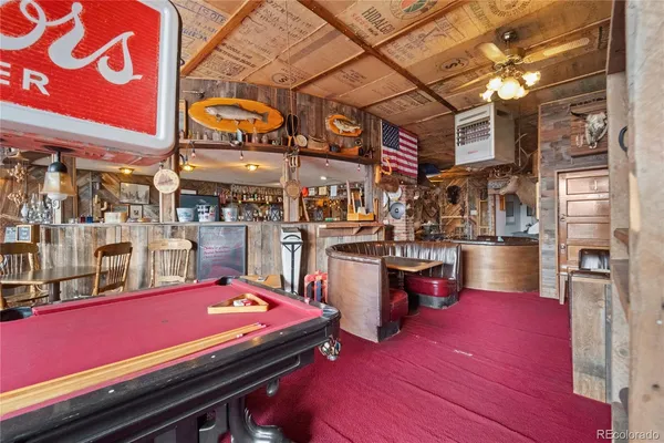 a area with lots of table and chairs