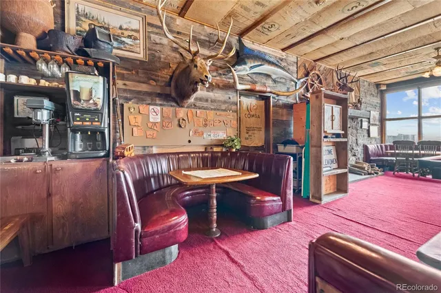 a kitchen with stainless steel appliances granite countertop a stove a refrigerator and a sink