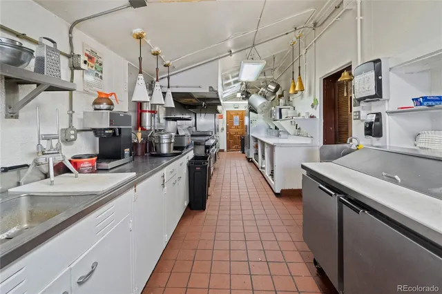 a bedroom with a bed and a mirror