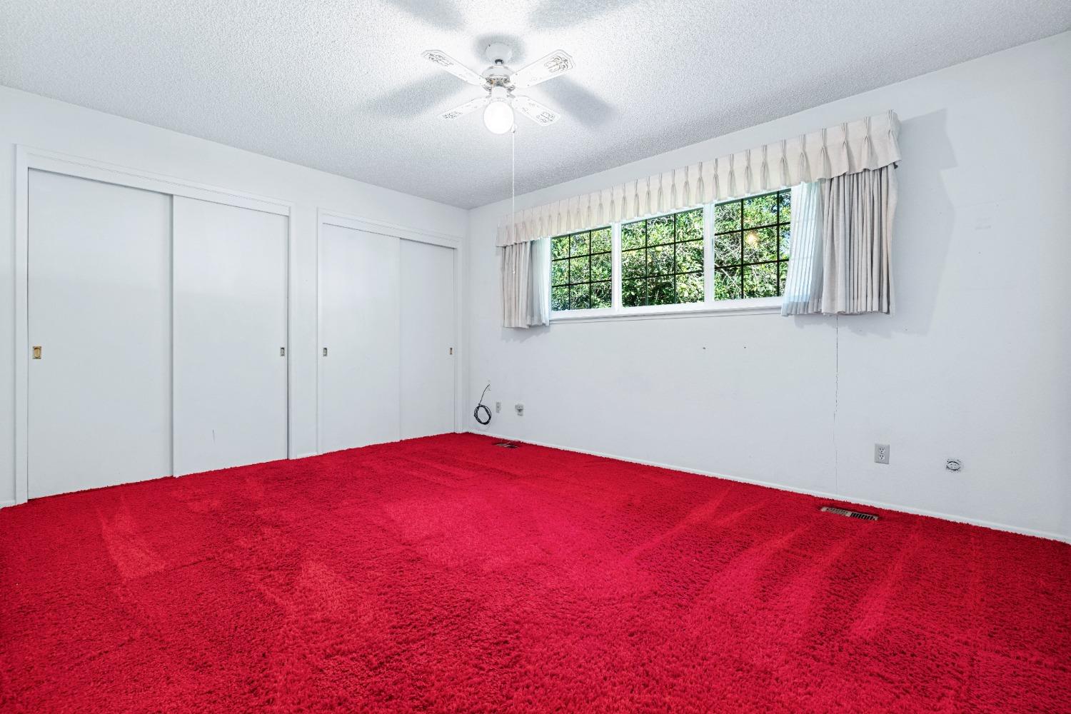 100 Hilton Street Madera, CA 93637 - Photo 11 of 30 a view of empty room with window