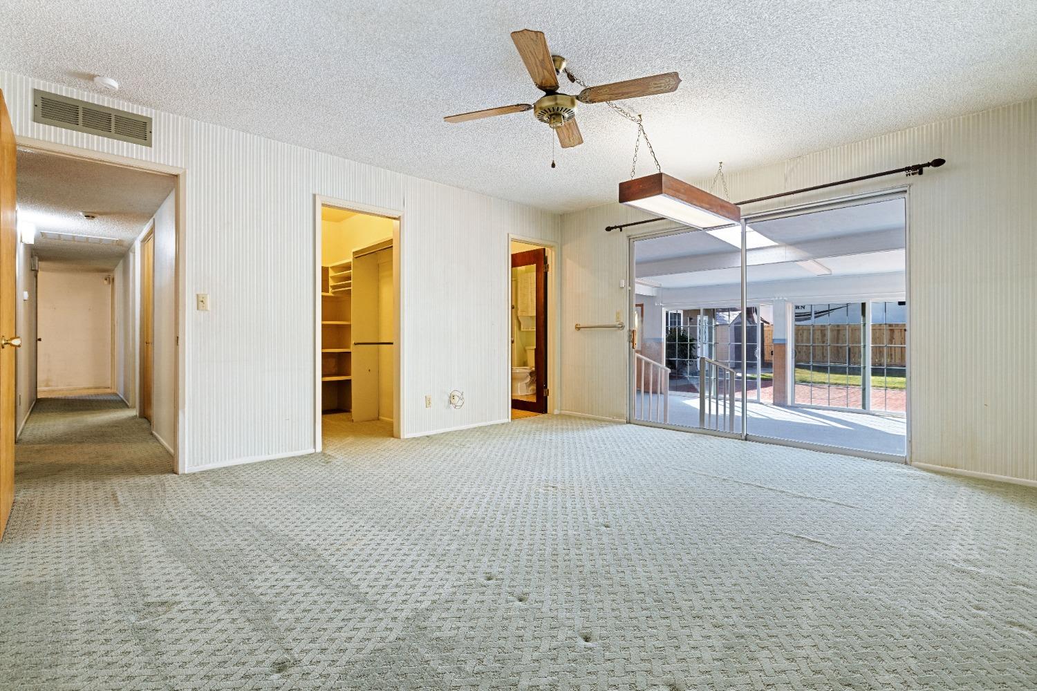 100 Hilton Street Madera, CA 93637 - Photo 13 of 30 a furnished livingroom with a ceiling fan